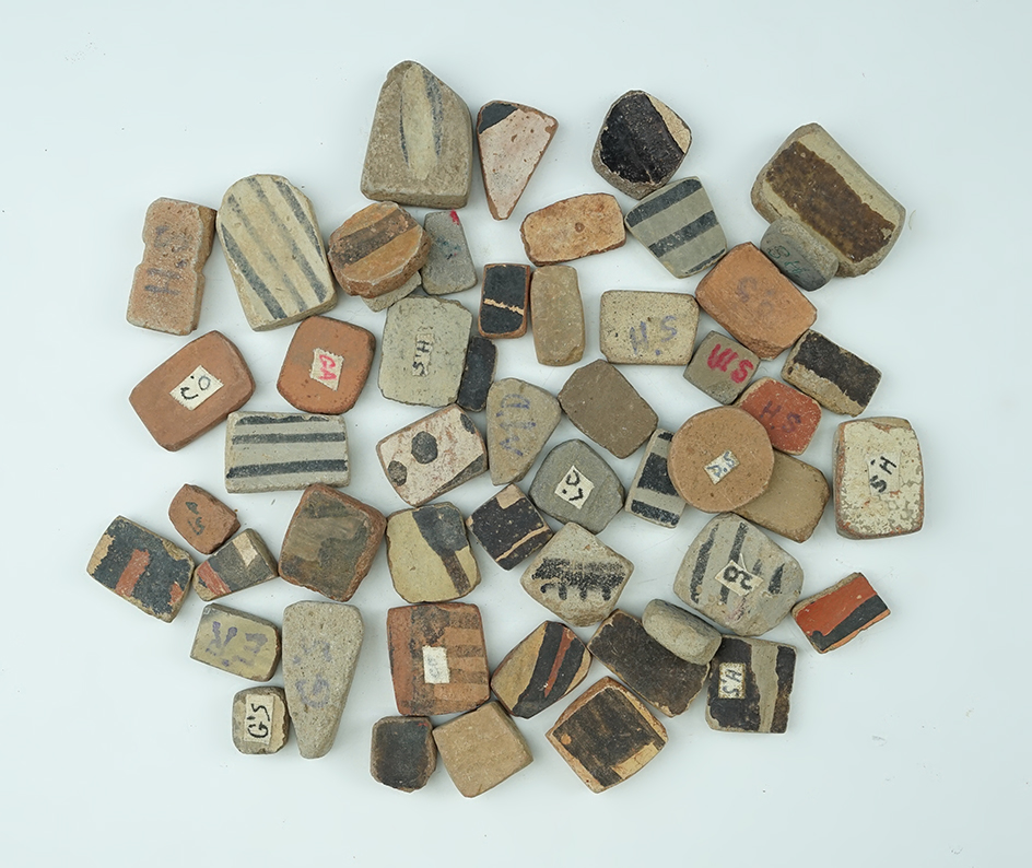 Set of 50 anciently salvaged pottery shards sanded into various shapes. All found in New Mexico.