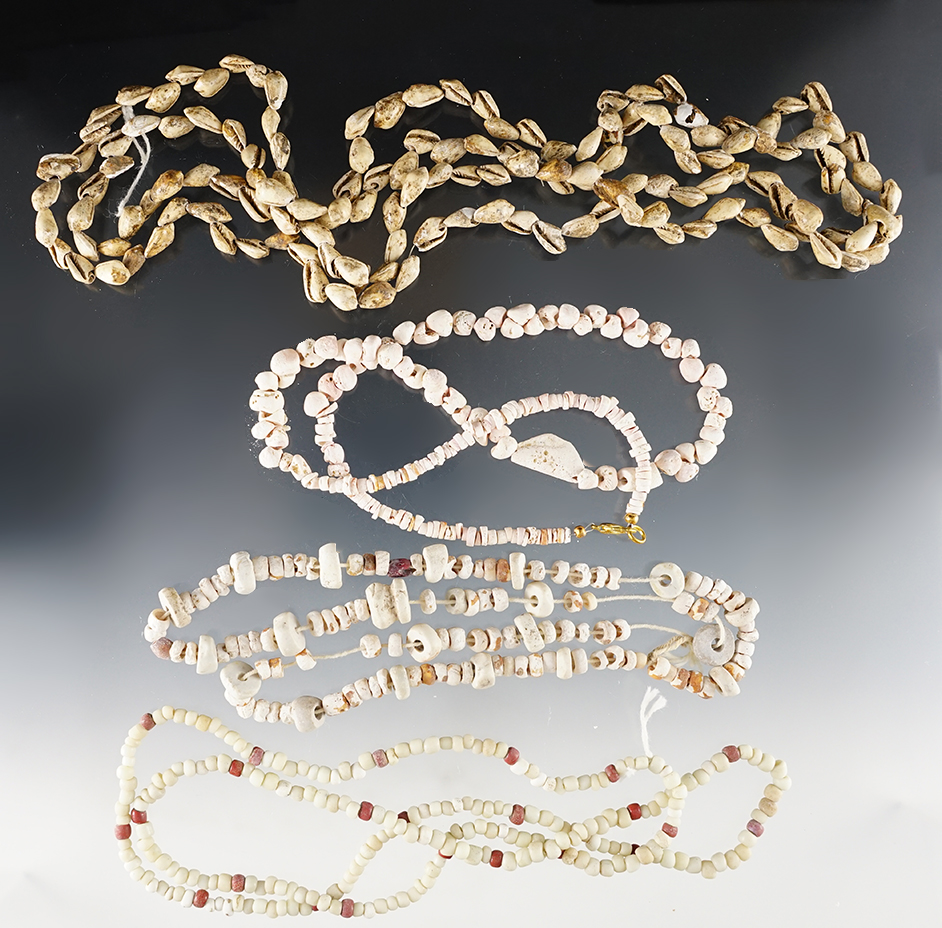 Set of 4 Necklaces made from glass and shell beads. Sizes are 48", 28", 18" and 20".