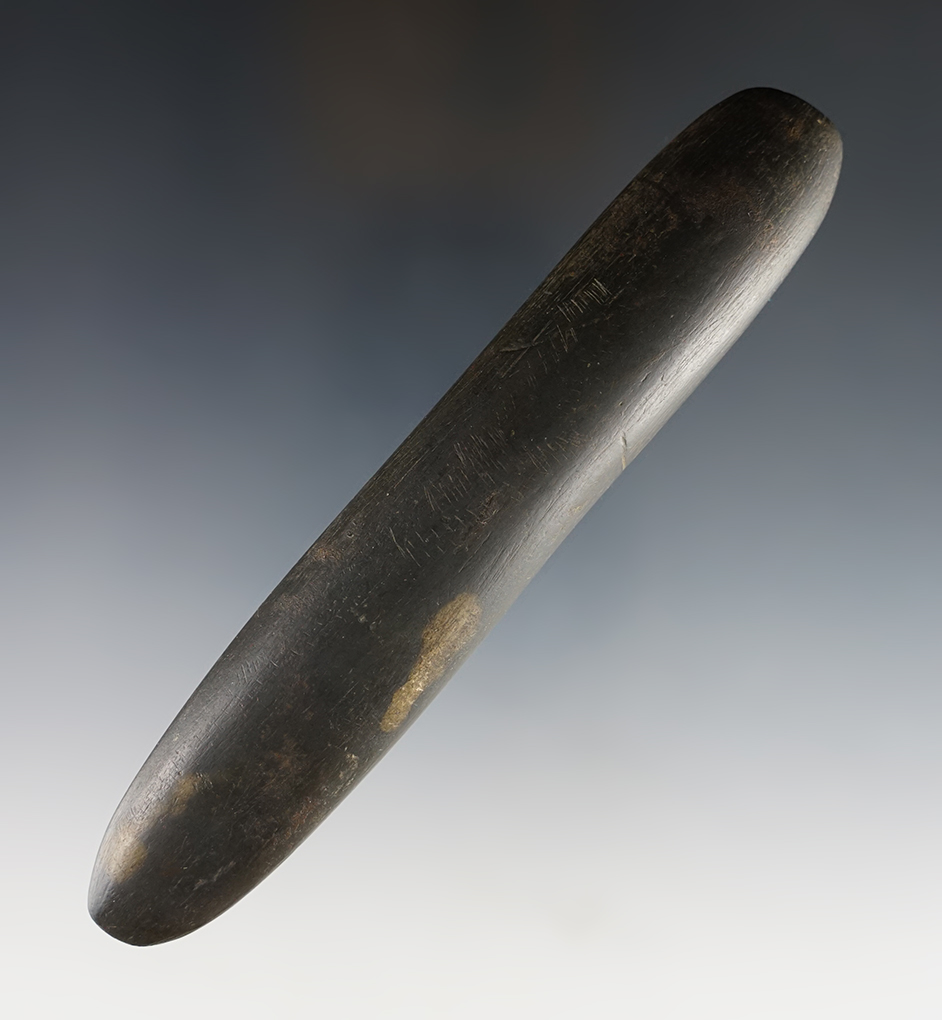 5 5/8" Slate Pick that is deeply patinated. Found in Logan Co., Ohio. Ex. James collection.