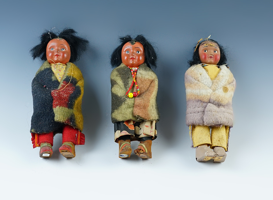 Set of 3 vintage Skookum Dolls. The largest is 6 1/2".