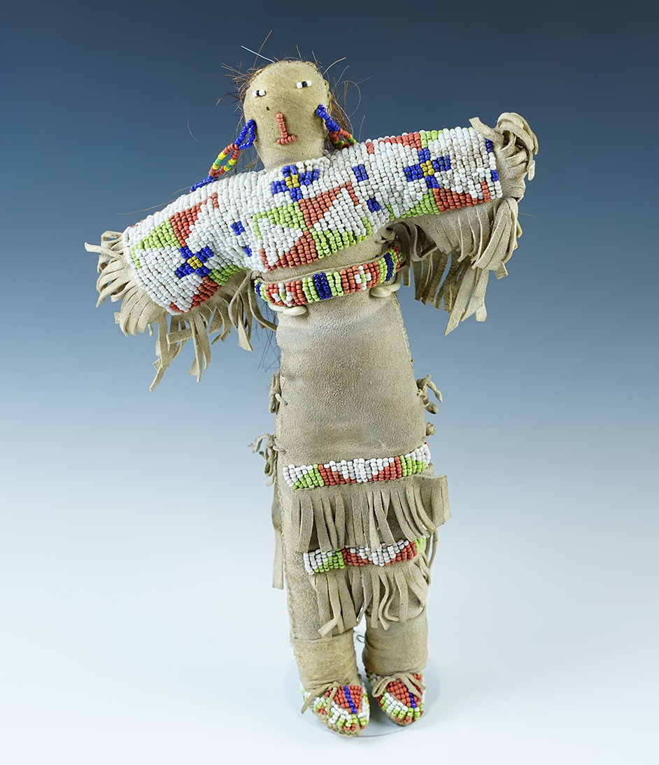 10 1/2" long vintage Skookum Doll with nice beadwork.