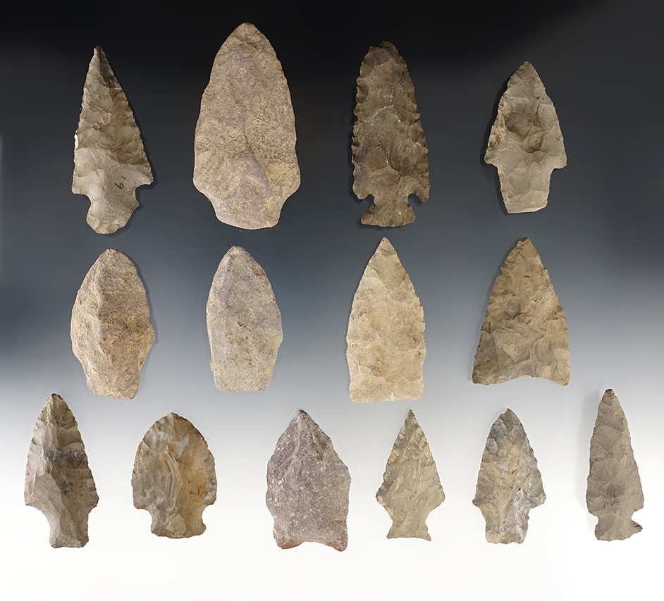 Set of 14 assorted New York points that are well patinated. The largest is 3 1/16".