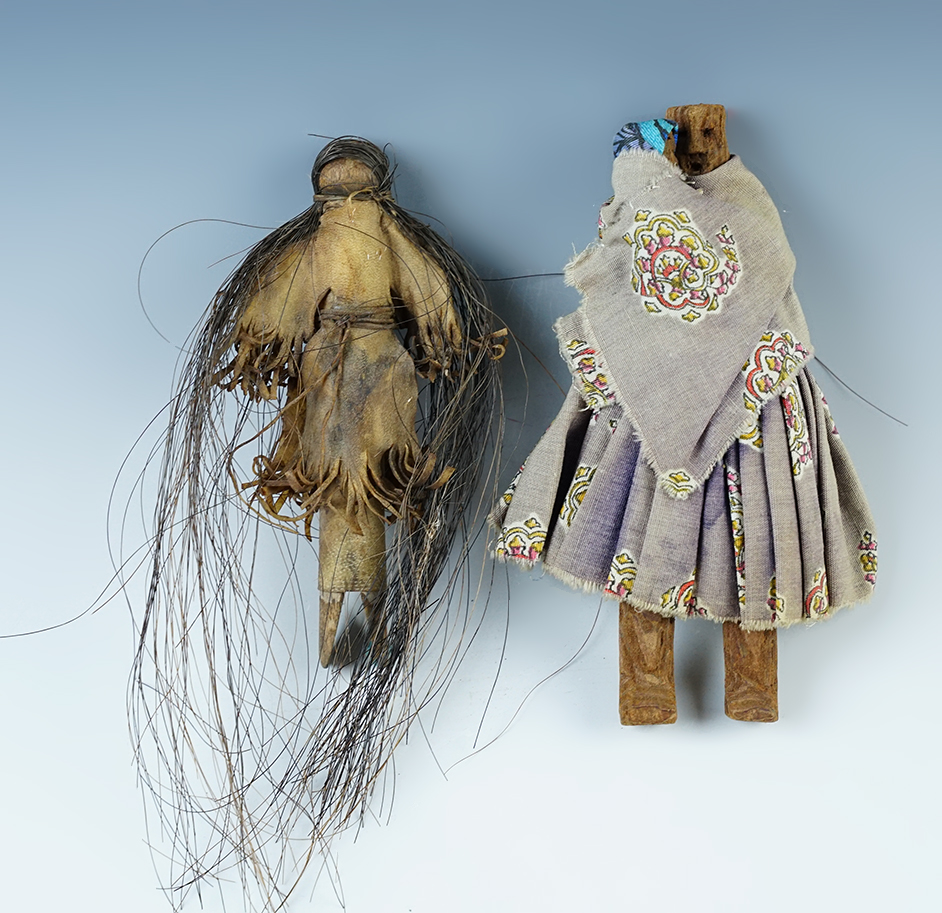 Pair of unique vintage Indian "clothespin" dolls in very nice condition. Largest is 5 1/4".