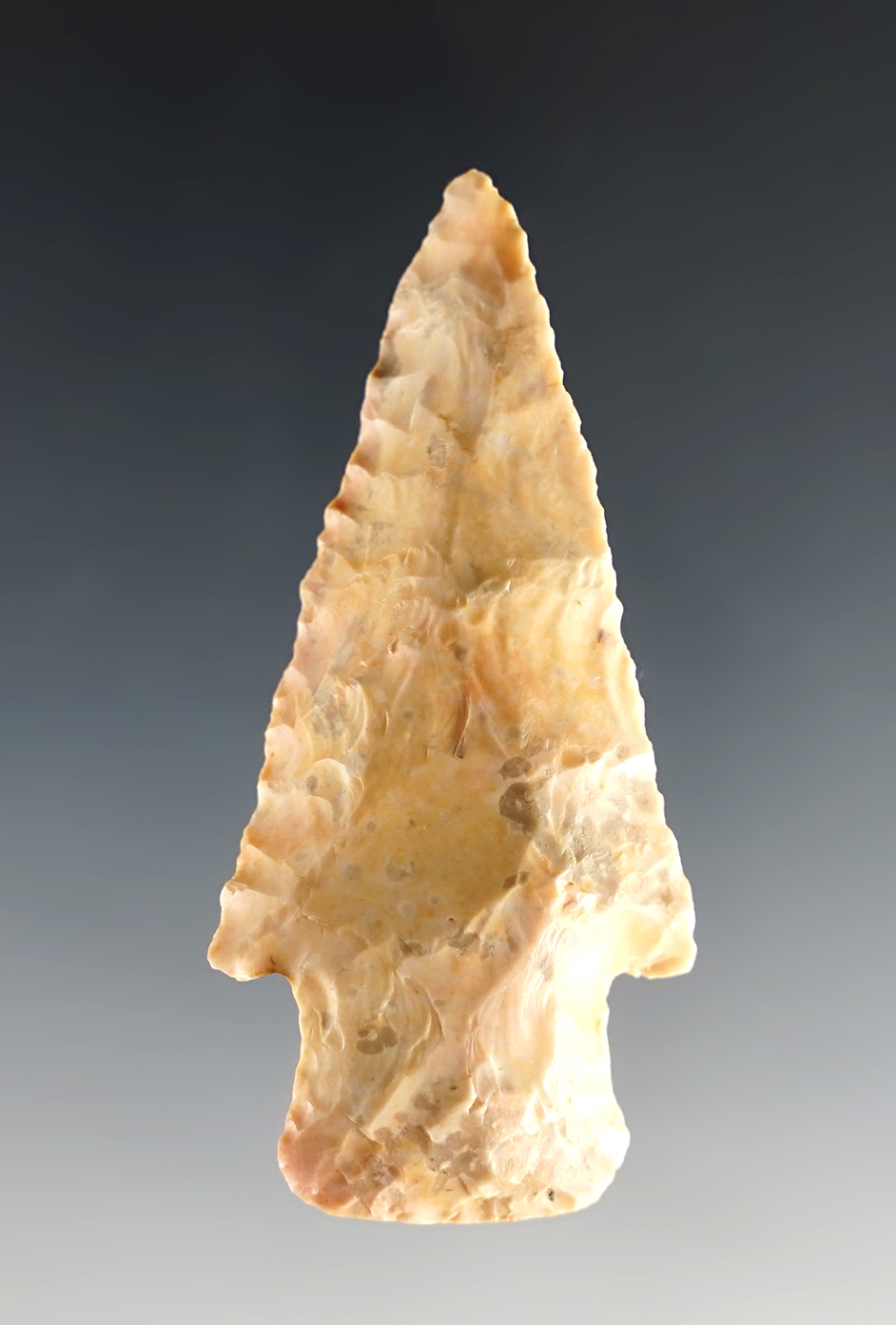 2 9/16" steeply beveled archaic knife recovered in Illinois.