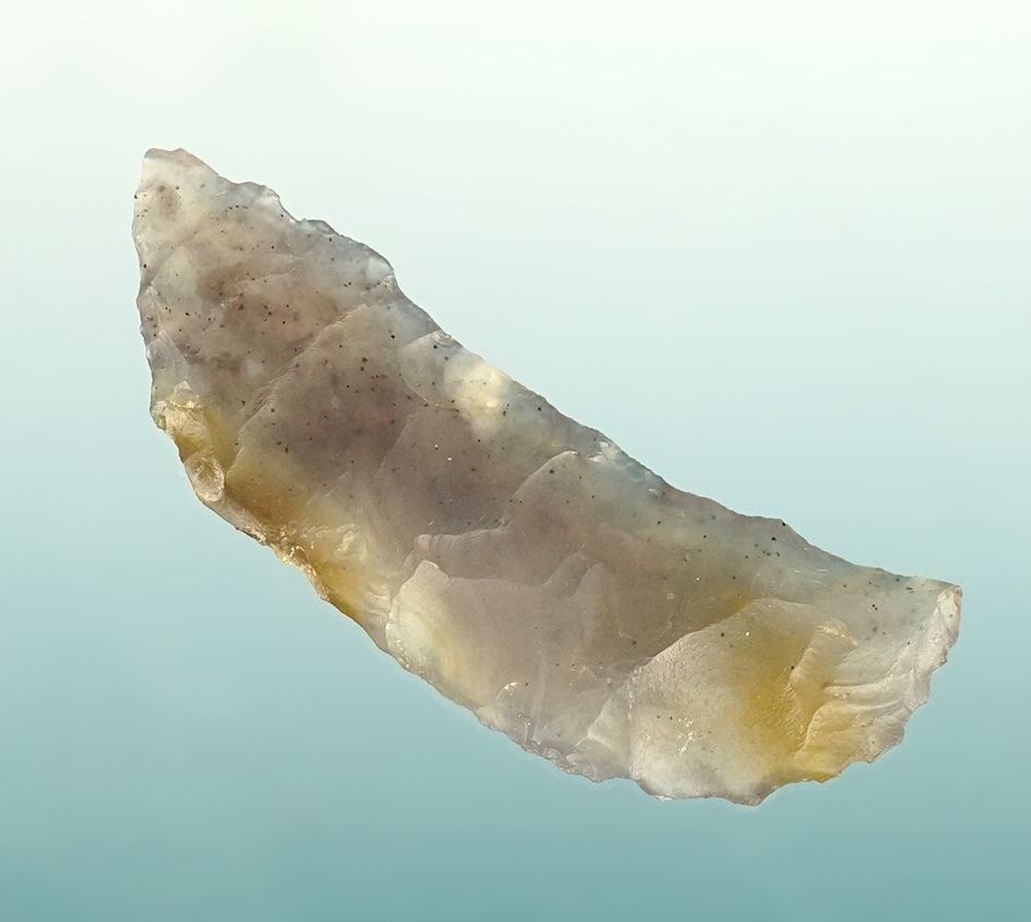 Semi-translucent 1 9/16" Paleo Crescent found in the Black Rock Desert region of Northern Nevada. 