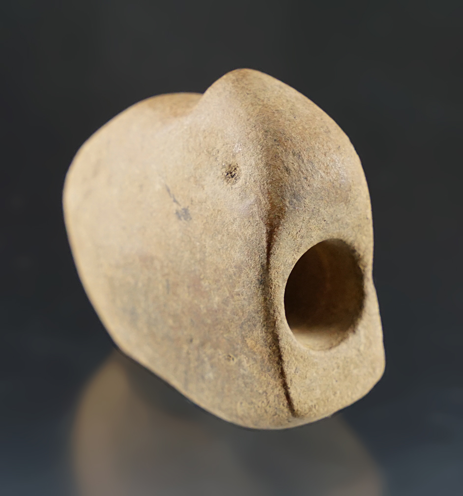 2 1/4" tall by 2 1/16" wide bird effigy pipe made from heavily patinated sandstone recovered in Ohio.