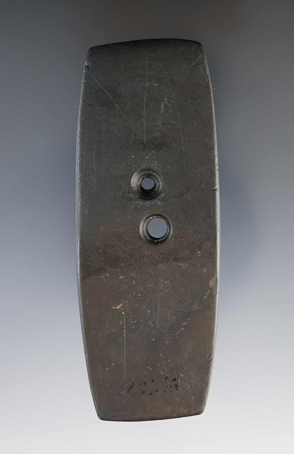 3 7/8" Hopewell Bar Gorget that is engraved and made from black Slate. Found in Ohio.