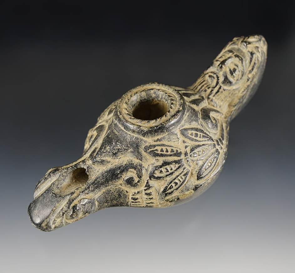 5 5/8" heavily patinated and nicely carved stone oil lamp from Southeast Asia. 