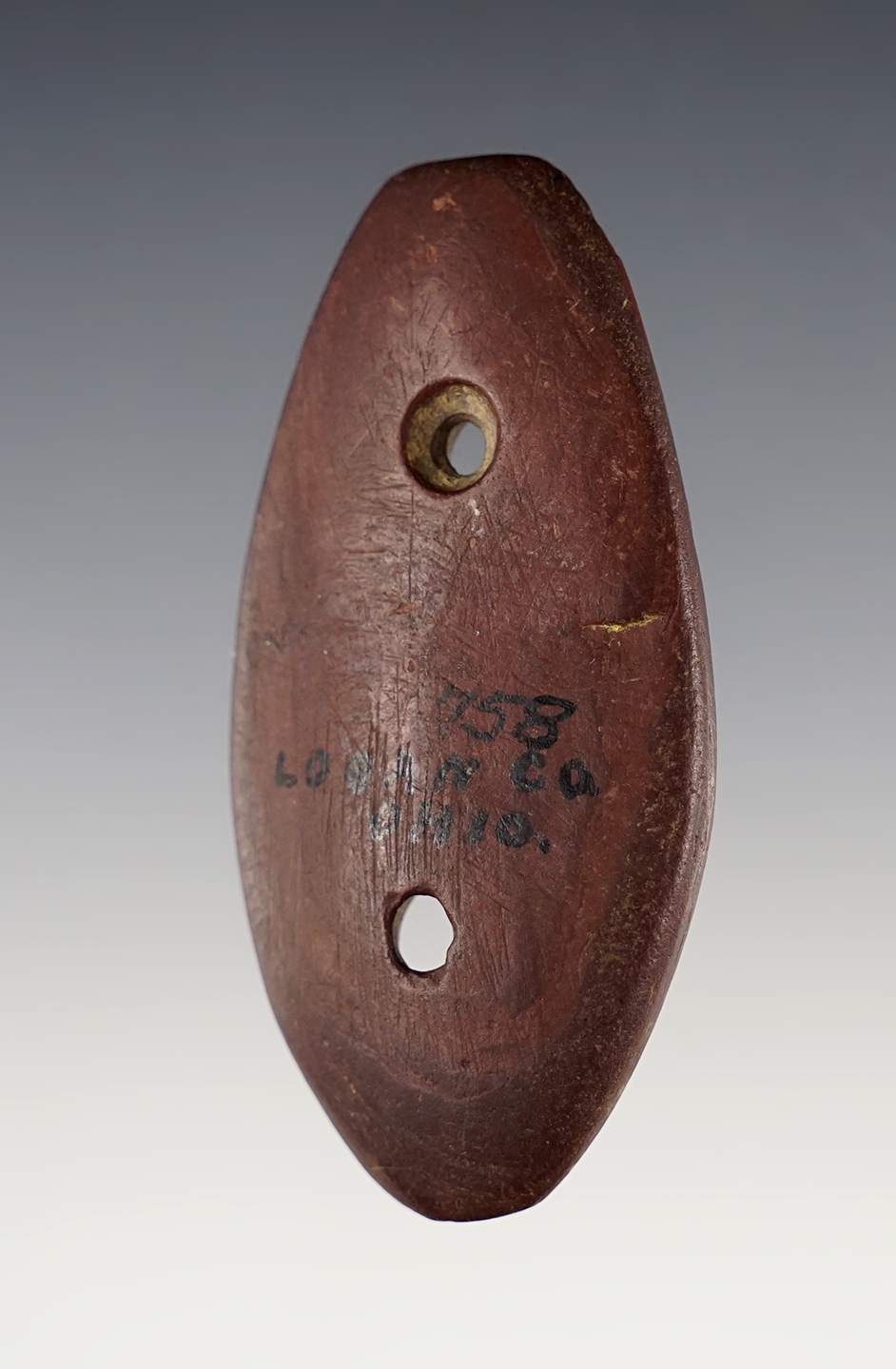 2 11/16" Oval Gorget found in Logan Co., Ohio. Made from beautiful red Banded Slate. 