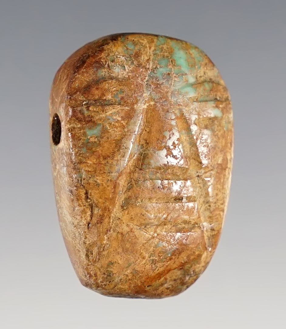 1 3/16" Face pendant,  Zapotec Culture, Oaxaca State, Mexico, 600-800 CE, turquoise.
