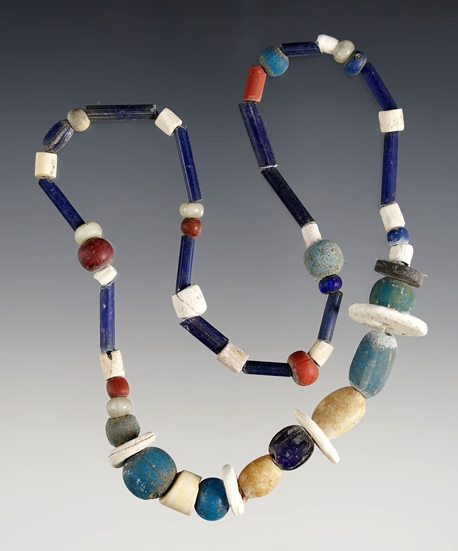 13" Strand red & blue Straw, Shell Wampum and Disc, Redwood, "Dutch" blue & Seed Beads. 