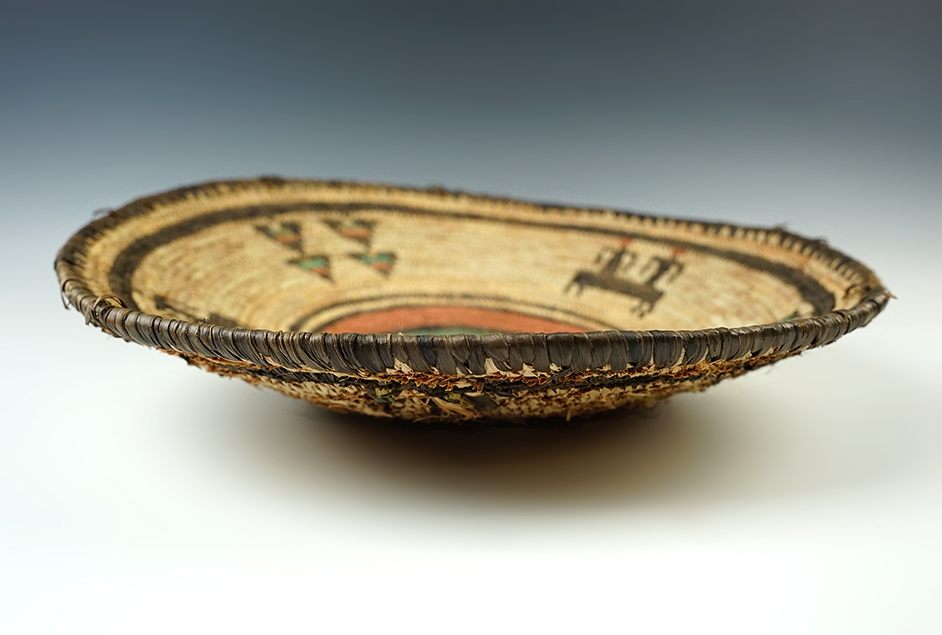 12" diameter colorful woven tray in nice condition. 