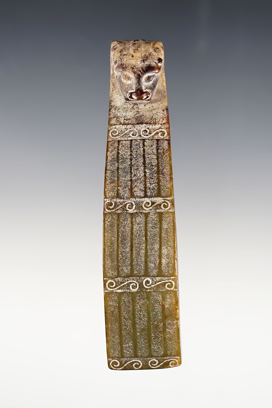 4 1/8" long heavily patinated beautifully carved Jade Belt Hook from Southeast Asia. 