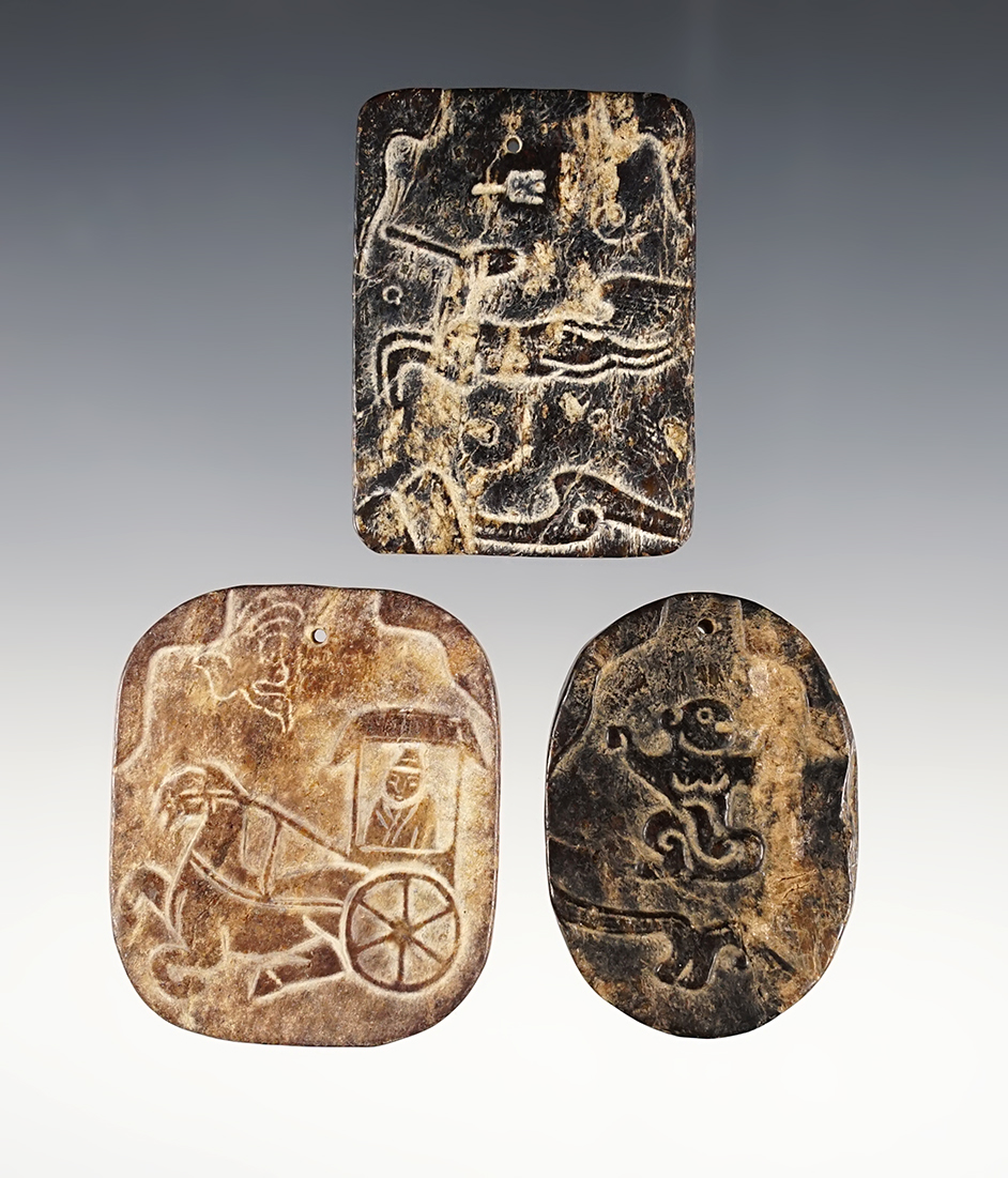 3 Drilled Jade Pendants with beautiful artwork in relief that are well patinated. Recovered in Asia. 