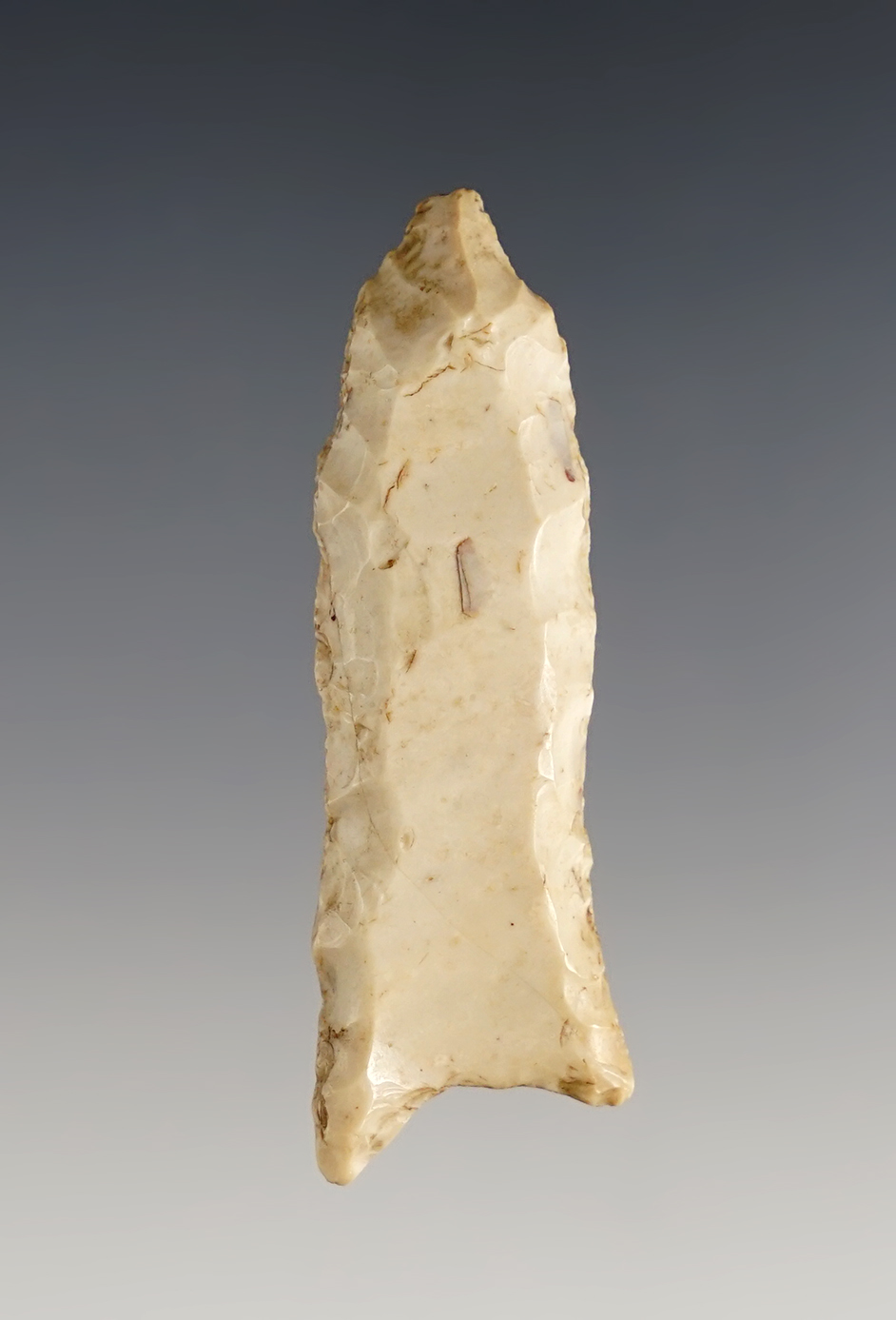 2 1/8" Fluted Paleo with a heavily ground stem and base. Found in Macoupin Co., Illinois. 