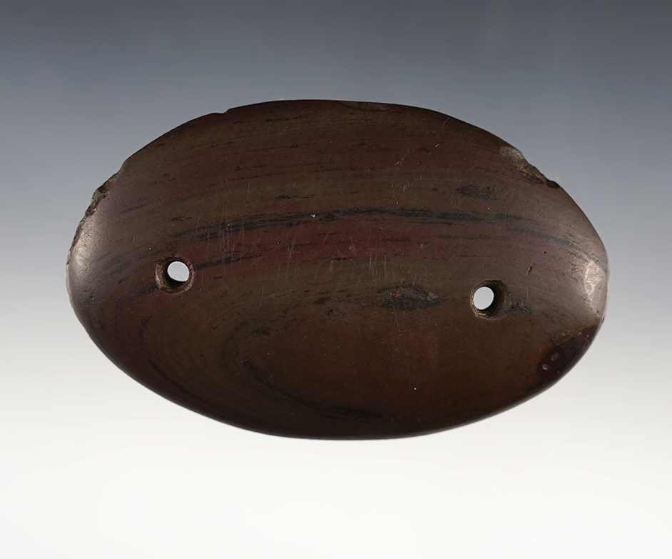 4" Red Slate Oval Gorget found in Butler Co., Ohio. Lightly tallied, 1 5/8" restored ding. 