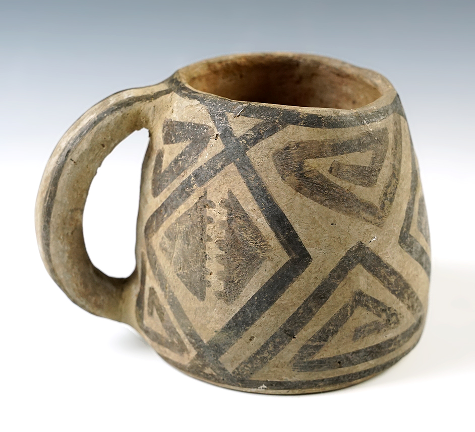 5 1/4" wide by 3 5/8" tall Anasazi - Pueblo III - Handled Pottery Cup that is nicely painted. 