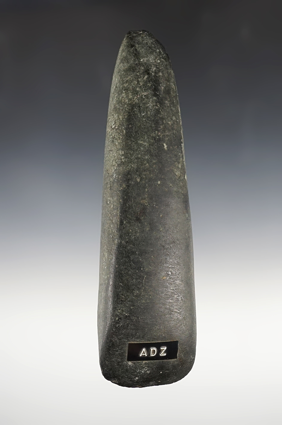 7 1/8" Aze that is made from dense Hardstone. 