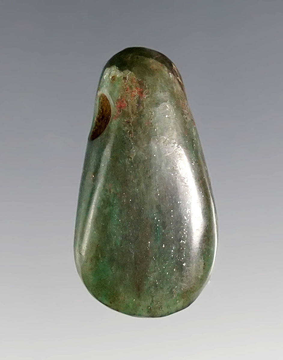 Small 1 3/16" Celt-form Pendant made from translucent Jade. Recovered in Costa Rica. 