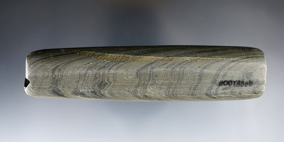 5 9/16" Archaic Tube Bannerstone made from green and black Banded Slate. Found in Wood Co., Ohio.
