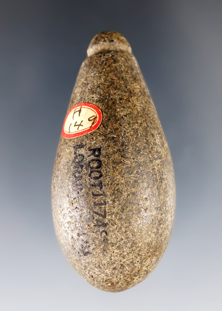 2 1/2" Archaic Plummet made from Granite. Found in Lorain Co., Ohio. Ex. Charles Justice, C.C. Thomas