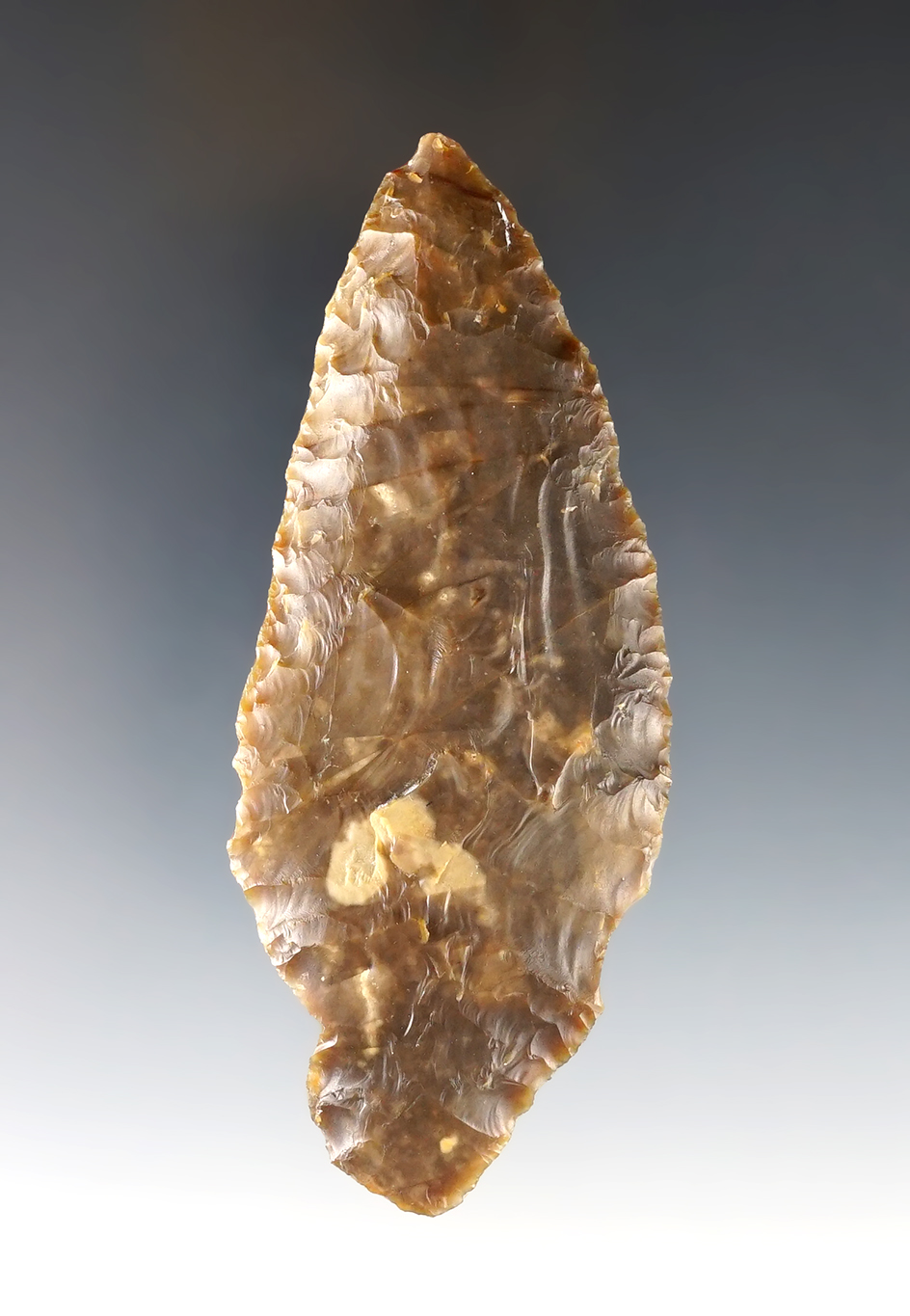 Uniquely styled base on this 3 3/4" stemmed knife found near the Columbia River.