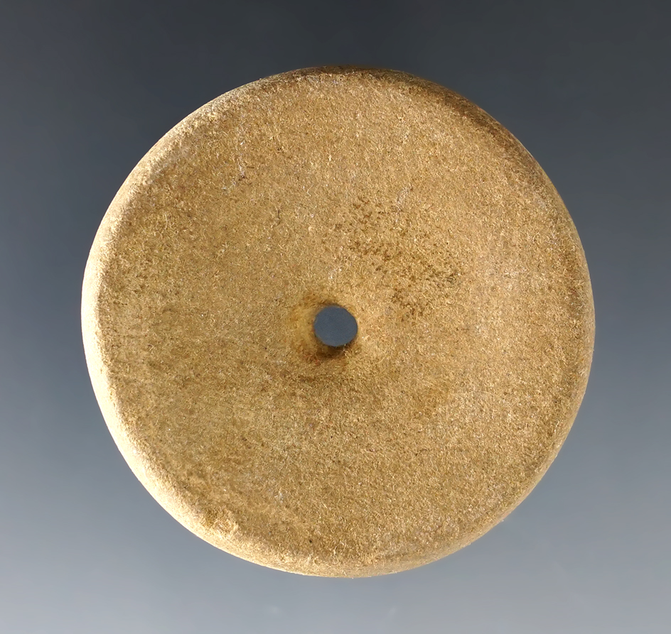 1 7/8" well styled Perforated Sandstone Fort Ancient Disk found in northern Kentucky.