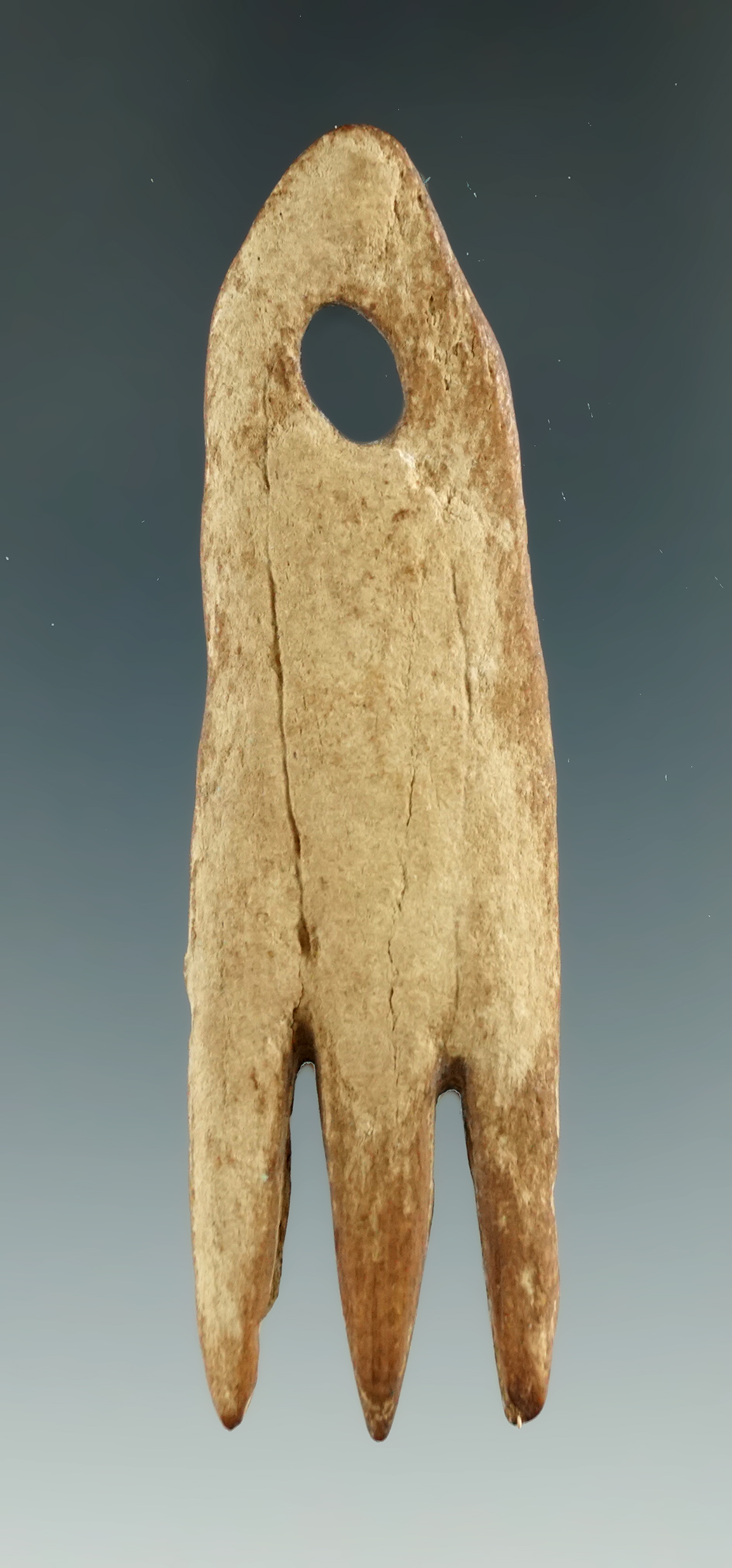 3" pre-Iroquois Point Peninsula three-pronged comb found in New York.