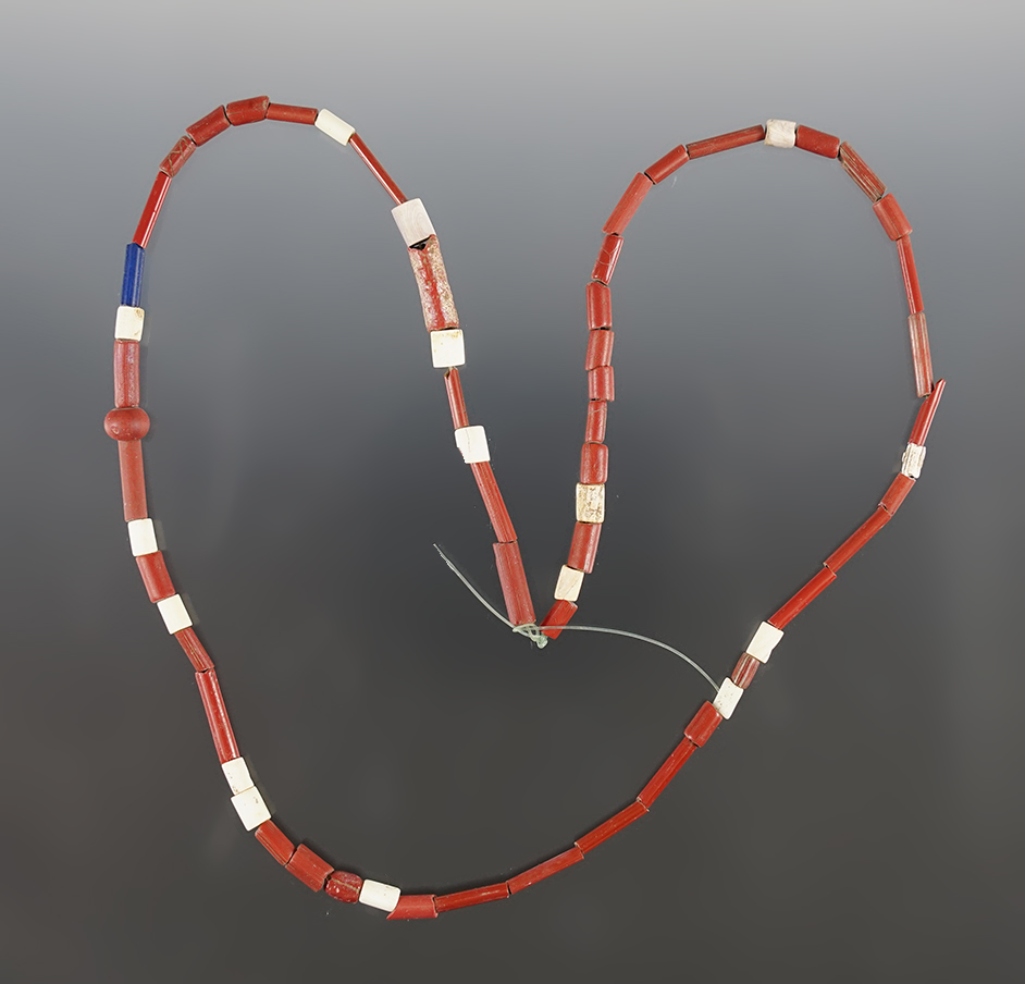 18" Strand of Beads including Shell, Red Tubular and 1 blue Bead. Power House Site in Lima, NY.