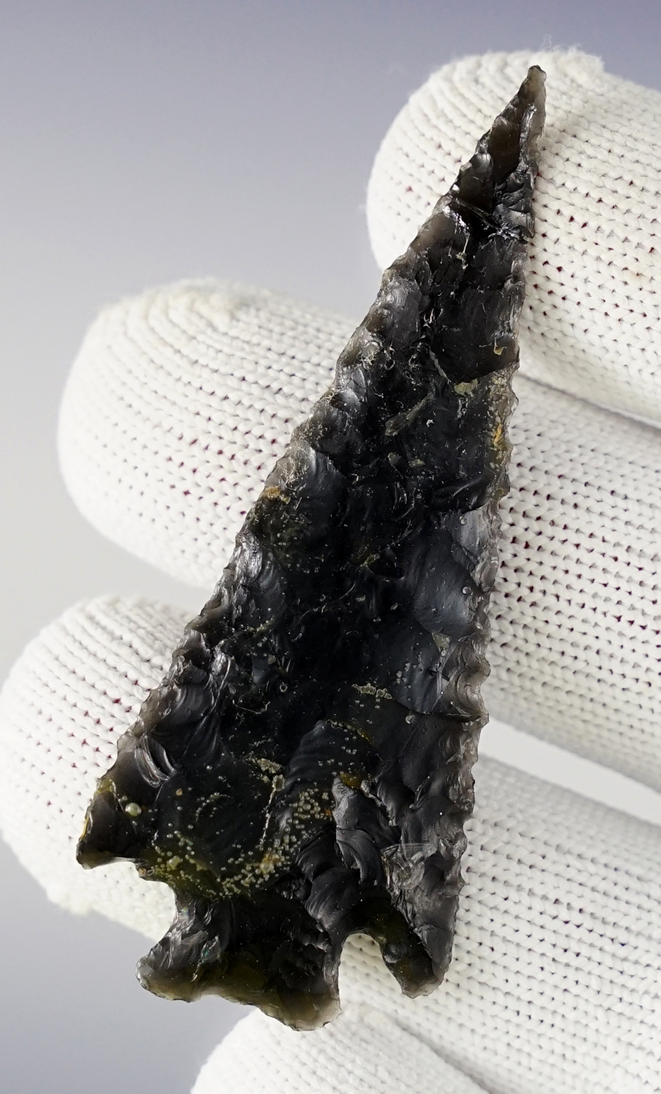 Thin and finely made 2 9/16" Elko Corner Notch with a broken and glued tip. Oregon.