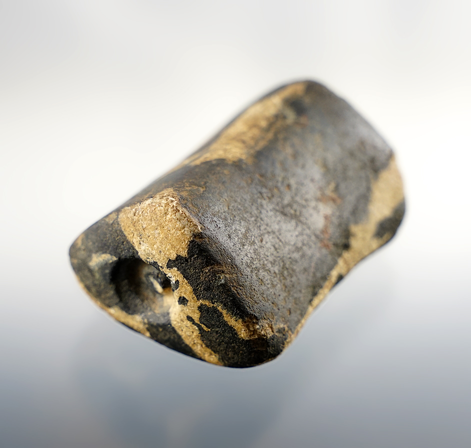 2 3/8" Prismoidal Bannerstone made from Gneiss. Drilling is started at one end, not completed.