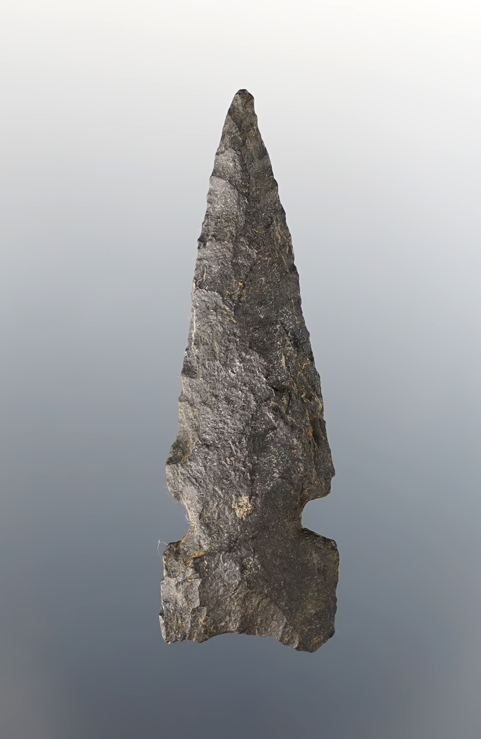 1 15/16" Sidenotch that is nicely flaked from basalt. Found near the Mid-Columbia River.