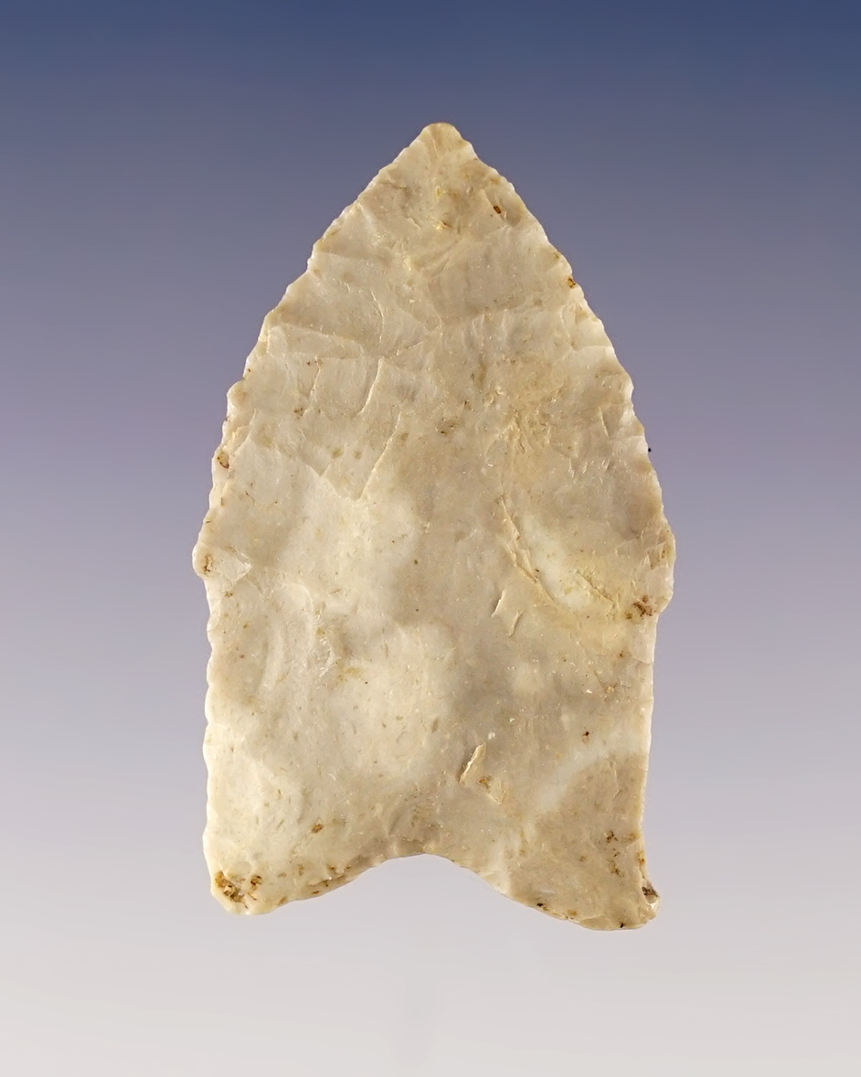 Thin and well made 1 13/16" Paleo Stemmed Dart point found in Illinois.