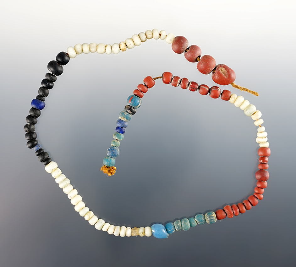 12" Strand of various Beads - including some Redwoods and small Blues -  Lima, New York.
