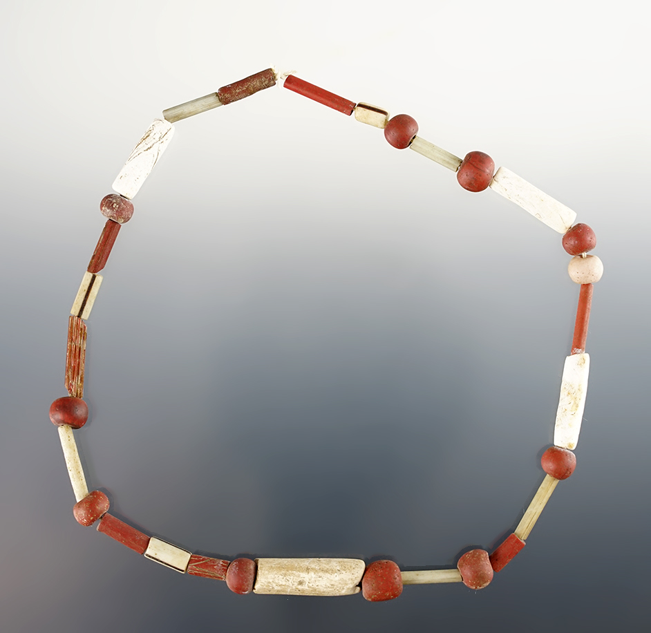 12" Strand of Beads consisting of Shell Tubular, Straws and Redwoods. Found in Lima, New York.