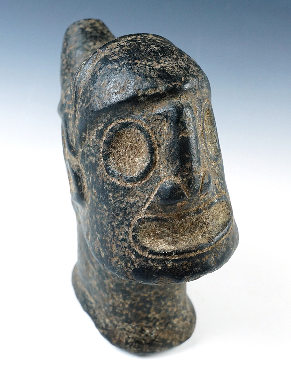 Nicely detailed 7" tall x 6" wide Taino Standing Head made from patinated Diorite. Puttera COA.