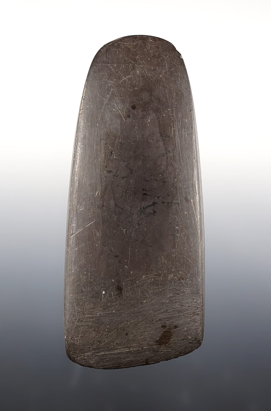 5 1/2" Slate Celt in excellent condition with a sharp bit. Found in the Ohio/Indiana area.