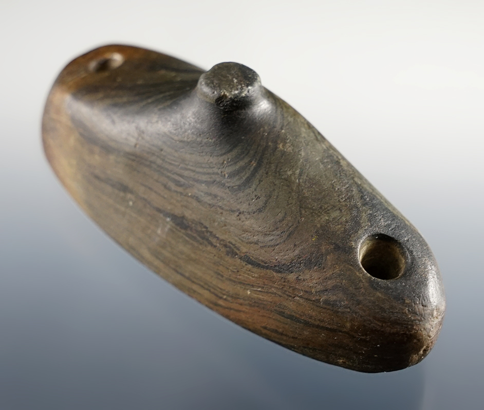 Nicely patinated 3 3/16" Spineback Gorget found in the Ohio/Indiana area. Pictured. Ex. Chadwick.