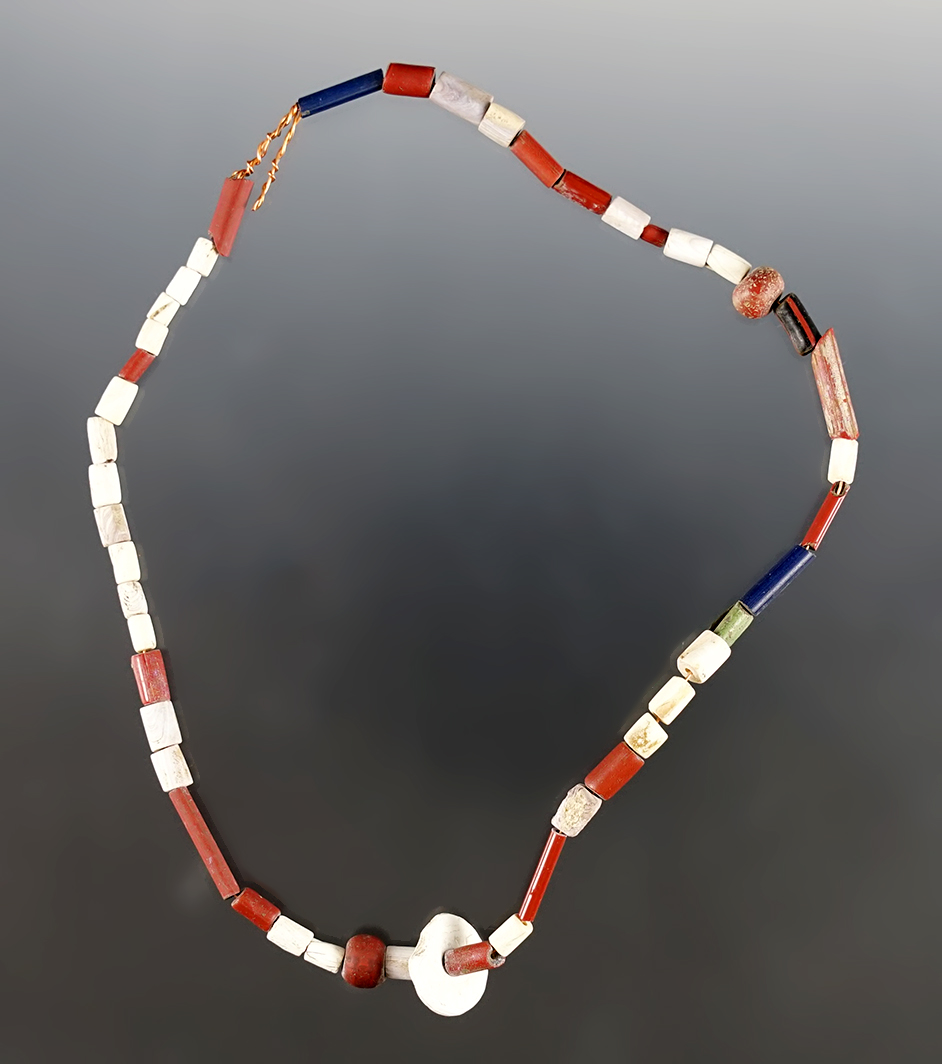 12" Strand of Wampum, red and blue Straws, Redwoods and Shell Disc Beads. Lima, New York. 