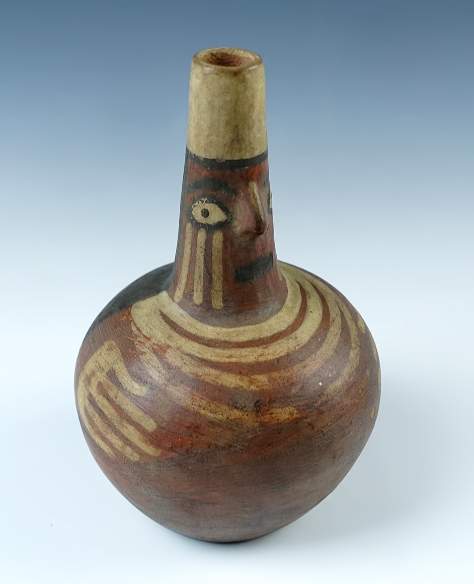 6" tall by 4" wide Nazca Effigy Polychrome Bottle in very nice condition, South America. 