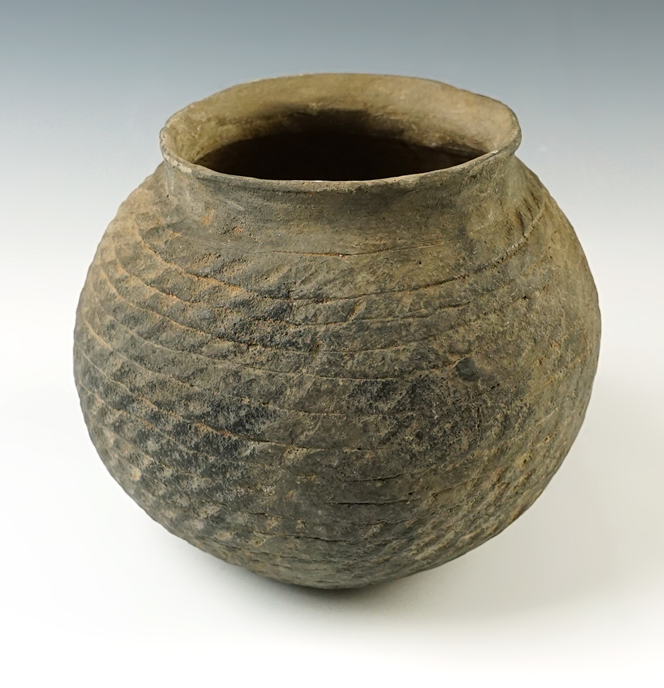 5 1/2" wide x 4 3/4" tall Pueblo III corrugated pottery jar. San Juan Co., Colorado. 