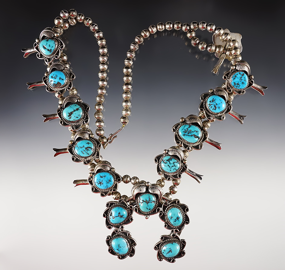 13 1/2" long contemporary squash-blossom necklace.