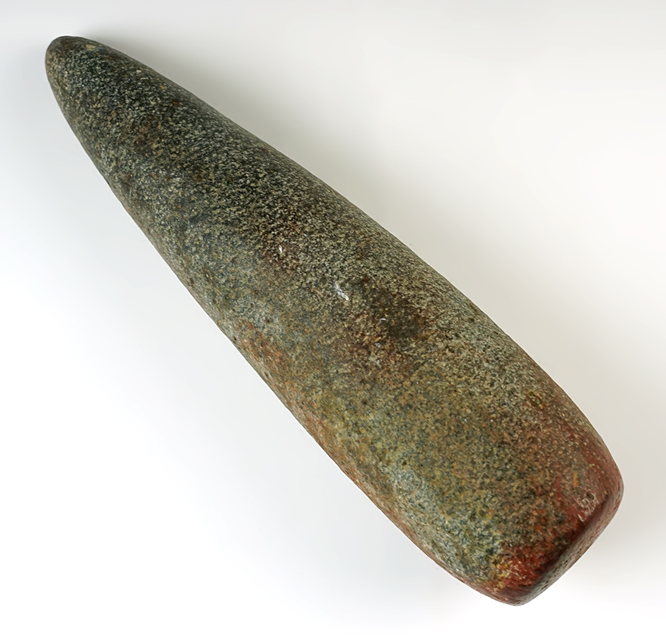 10" Conicle Pestle with heavy use polish on handle and bottom. Heavy red orchre staining.