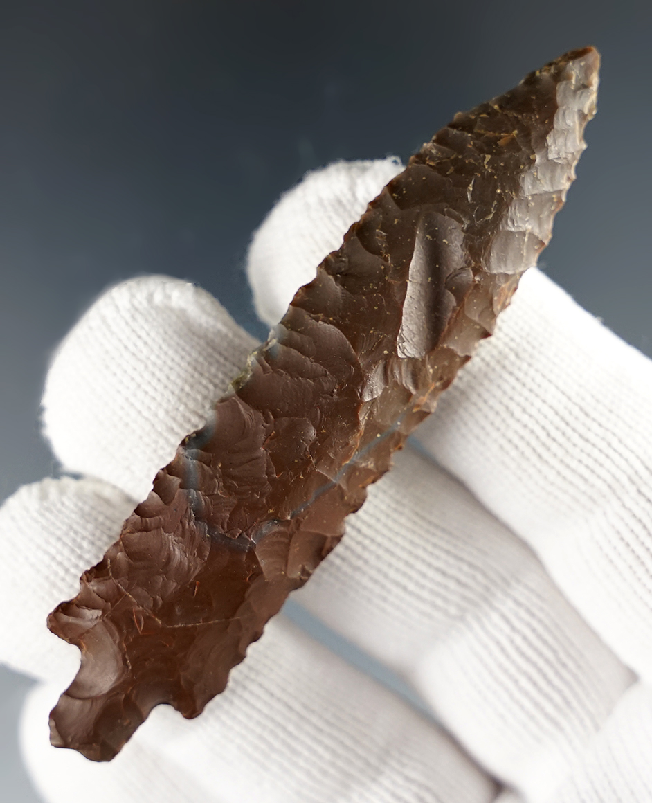 Well made 3 3/16" classic Bear point found in Alaska. Made from chocolate-colored flint.
