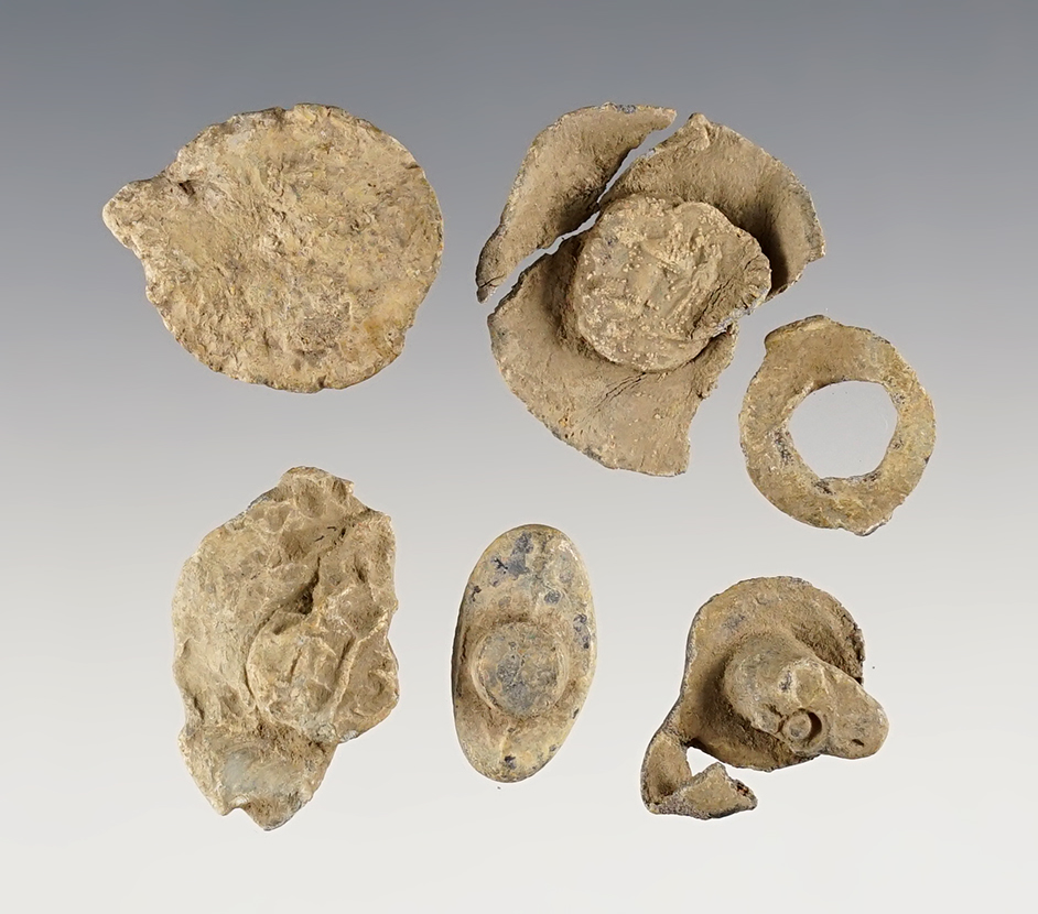 Set of textile lead bale seals recovered at the Dann Site in Lima, Monroe Co., New York. 