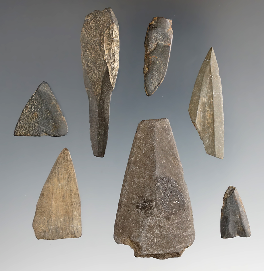 Group of seven slate points found in Alaska, some have damage. Largest is 2 1/16".