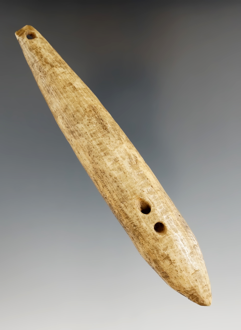 Uniquely drilled 5 7/8" Ivory Fishing Lure found in Alaska. Comes with a Bennett COA.