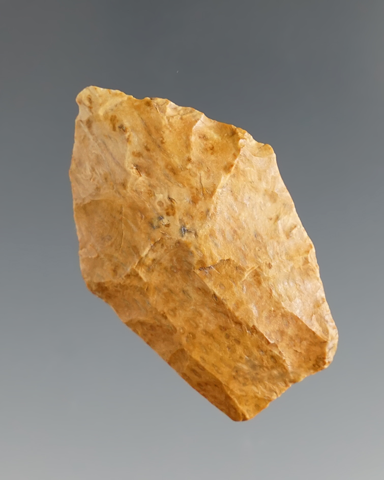 1 7/16" Paleo dart point found in Colorado. Heavily ground basal area.