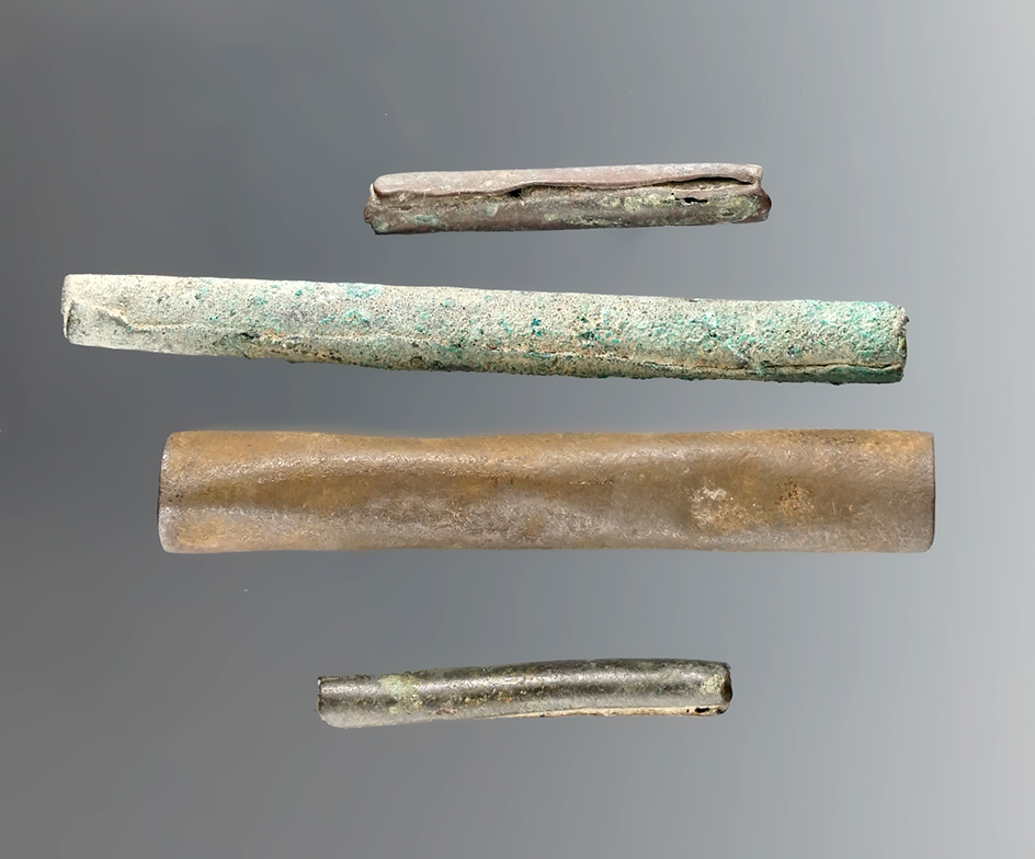 Set of 4 Columbia River Rolled Copper Beads, largest is 1 13/16". Ex. Daryl Baker Collection.