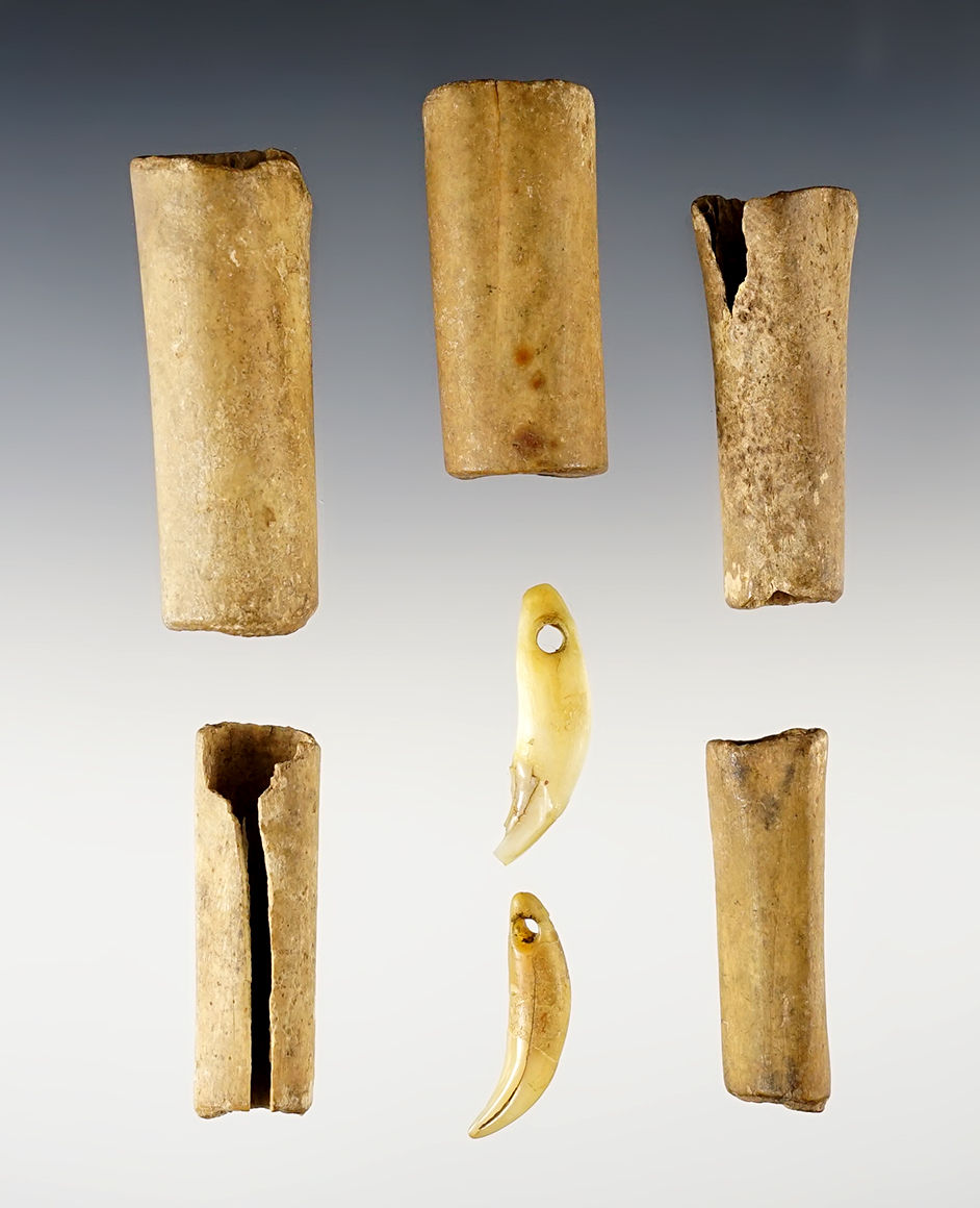 Set of 7 artifacts including 5 Bone Beads and 2 Drilled Teeth. Found in Kentucky. The largest is 2 1/8".